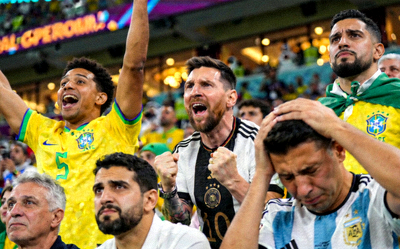 世界杯看台上各国球迷表情特写，展现喜悦、紧张、失望等丰富情感